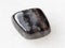 pebble of anthophyllite gemstone on white