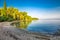 Pebble beach on Brac island with turquoise clear ocean water, Supetar, Brac, Croatia