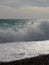 Pebble beach of Nice, France with azure waves of mediterranean sea