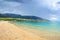 Pebble beach Zlatni Rat or Golden Horn, Bol, Brac Island, Croatia. Scenic gravel beach, mountain and turquoise sea water