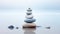 Pebble cairn, stack of smooth pebbles reflecting in shallow water on the seaside. Stone stack in a misty ocean. Generative AI