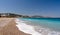 Pebble coastline with beautiful blue sea at Rhodes island, Greece