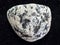 pebble of Diorite stone on dark background