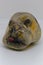Pebble painted with a colorful picture of a bulldog