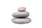 Pebble pile on white background isolated close up, stack of balanced zen stones, smooth sea pebbles pyramid, cobblestones tower