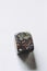 Pebble polished tumbled stone Dragon\\\'s blood jasper on a white background with empty spac