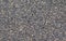 Pebble stones background, dark gravel texture close up