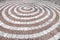 Pebbles mosaic floor with spiral pattern