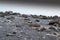 Pebbles at Reynisfjara aka black sand beach. A world-famous tropical beach found on the South Coast of Iceland.