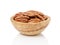 Pecan halves in a bowl isolated on a white