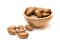 Pecan nuts in small wooden bowl