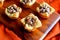 Pecan Pie Tartelettes Served on a Wooden Cutting Board