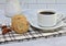 Pecan sandies cookies with a cup of coffee