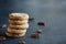 Pecan Sandies Cookies Stacked on a Dark Background