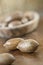 Pecans Carya illinoinensis, hickory family and a wooden bowl