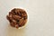 Pecans in a Container on a Kitchen Countertop, Positioned Left