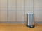 Pedal bin on wooden floor