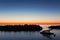 Pedalo moored in the sea at dawn