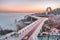 Pedestrian bicycle bridge, Kyiv Ukraine, dawn, heavy fog spreads over the Dnieper river, aerial view