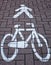 Pedestrian and bicyclist road sign. Painted signs on the sidewalk