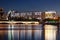 Pedestrian bridge over the river Ishim in the evening. Embankment. Astana. Kazakhstan