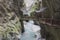 Pedestrian bridge over river in Trient gorge. Vernayaz, Martigny, Switzerland