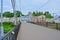 Pedestrian bridge through Tvertza river in Torzhok city