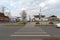 A pedestrian crossing over the roadway leads to the central square with historic buildings. Yeniseisk. Krasnoyarsk region. Russia