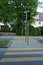 Pedestrian crossing or zebra crossing with a set of stoplight or traffic lights in a a residential district in Switzerland