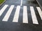 Pedestrian crossing the zebra road