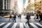 pedestrian crosswalk comes alive as a blur of people traverse the city road, bustling metropolis