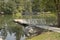 Pedestrian ladder and platform on a lake.