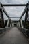 Pedestrian overpass with blue sky