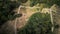 Pedestrian paths in the city park. Vintage benches and lanterns. City park at dawn. Aerial photography