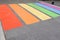 Pedestrian rainbow colored zebra crossing markings in LGBT colors