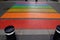 Pedestrian rainbow colored zebra crossing markings in LGBT colors in bordeaux france