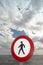 Pedestrian signal in a mediterranean coastine landscape.