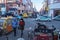 A pedestrian street in China with a lot of masked people on their faces in winter