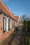 Pedestrian street in of the Dutch village in North Holland