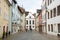 Pedestrian street in Fussen with typical bavarian buildings.