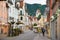 Pedestrian street in Fussen with typical bavarian buildings.