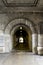 Pedestrian tunnel in Pont du Carrousel bridge at Seine river promenade in Paris city centre