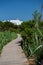 Pedestrian walkway on Migjorn beach in Formentera in Spain in Times of COvid 19