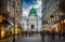 The pedestrian zone Herrengasse with a view towards imperial Hofburg palace in Vienna, Austria.