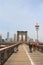 Pedestrians and bicyclists crossing Brooklyn Bridge