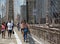 Pedestrians and bicyclists crossing Brooklyn Bridge