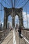 Pedestrians and bicyclists crossing Brooklyn Bridge