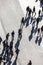 Pedestrians cast shadows walking along the Zeil in Frankfurt am Main