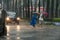 Pedestrians crossing street during Typhoon Megi