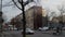 Pedestrians and Cyclists crossing the street and cars turning at traffic lights at intersection of Urbanstrasse and